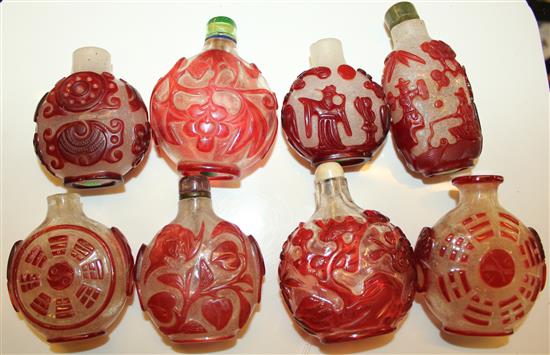 8 carved red glass snuff bottles